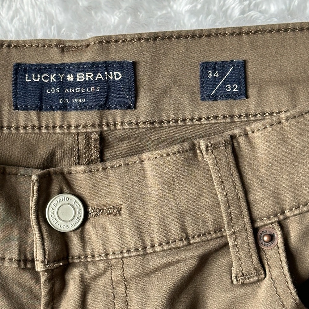 Men's Lucky Brand tan pants.